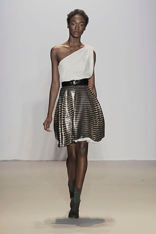 white asymmetric top with black skirt