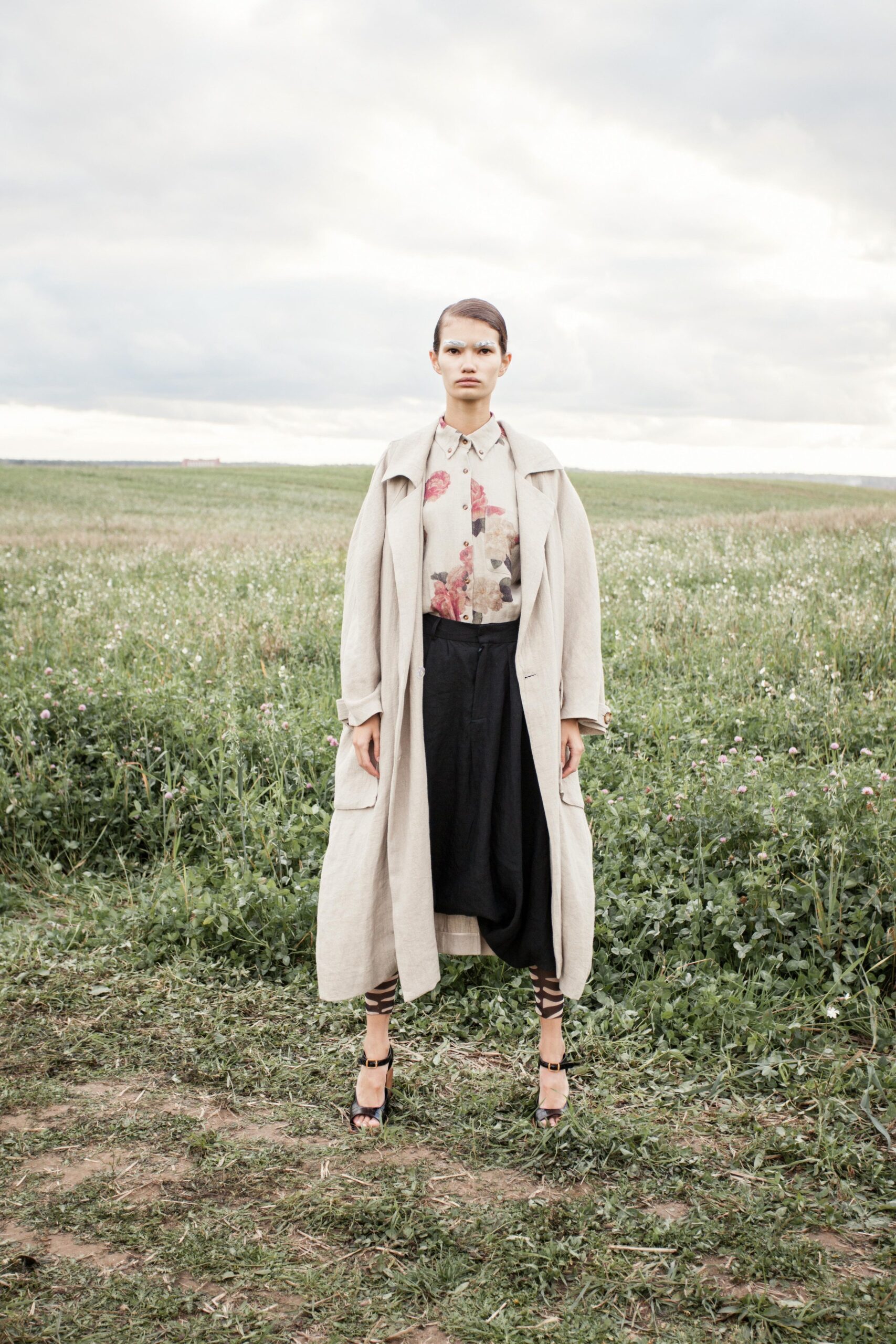 beige linen coat with floral blouse