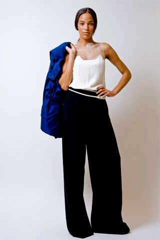 white silk pleated top with blue jacket