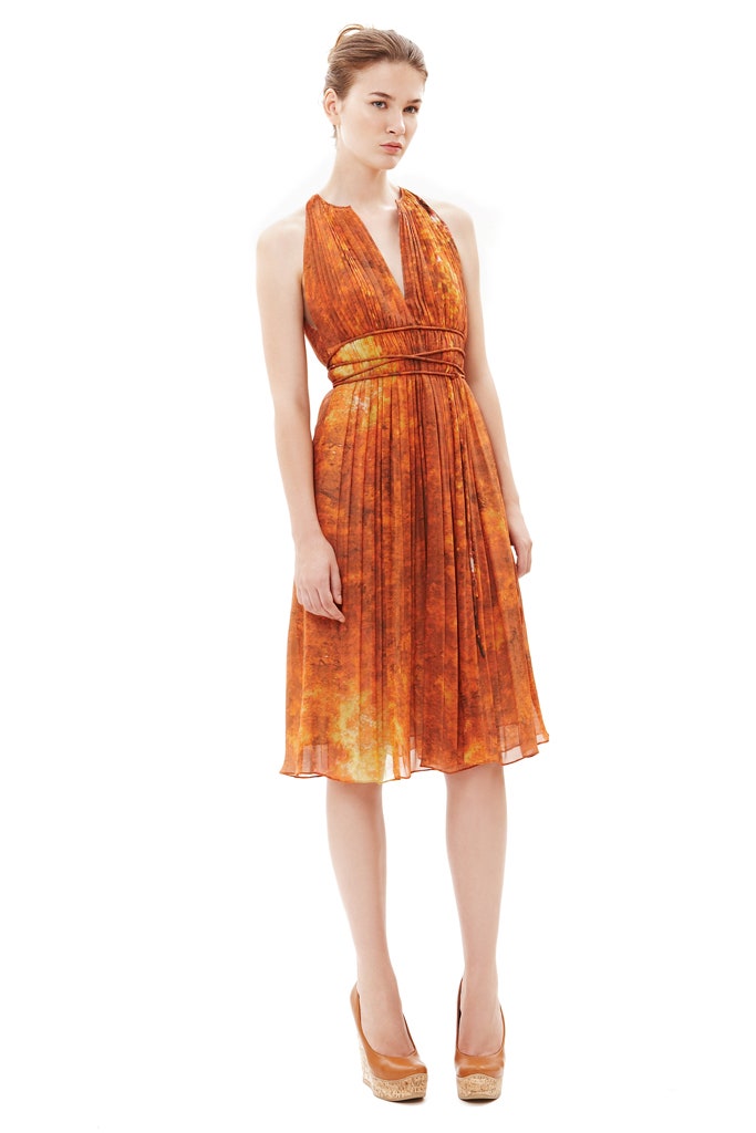 fitted orange silk pleated dress