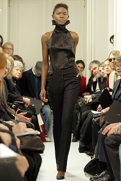 black silk fitted top and tailored pants