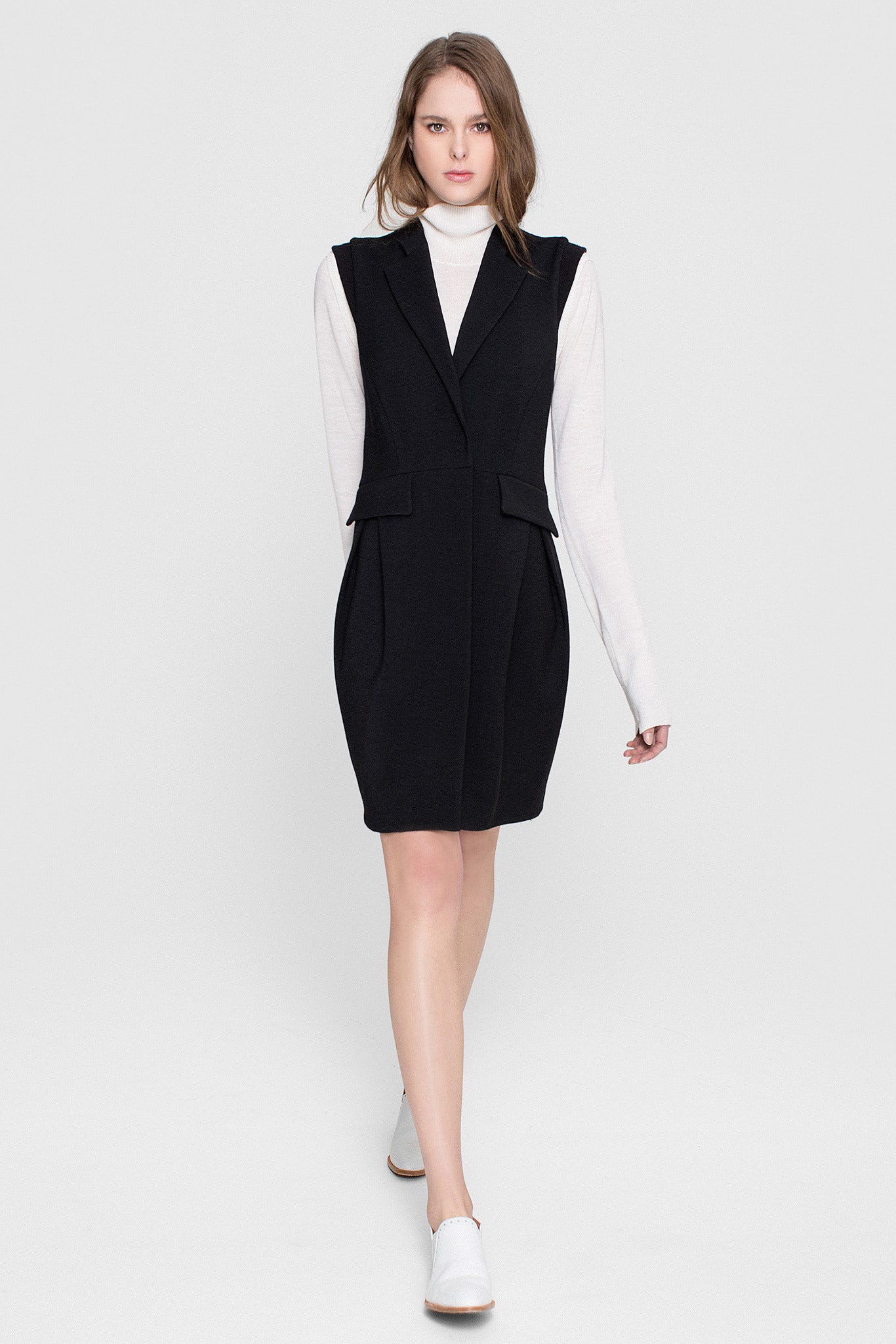 black fitted dress with white turtleneck