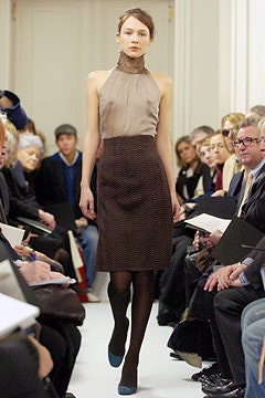 beige silk sleeveless top and brown pencil skirt