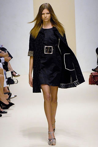 black wool long-sleeve collared relaxed buttoned flared coat