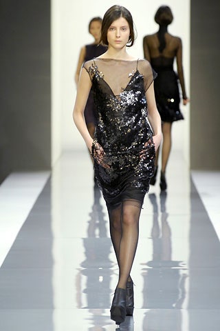 black sequin sleeveless dress