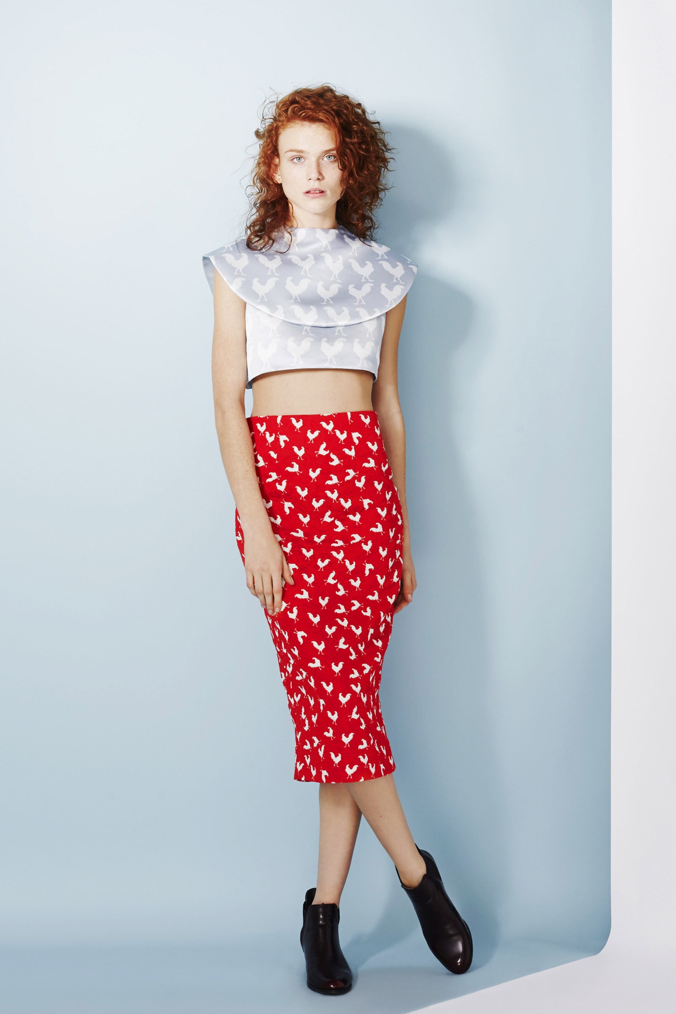 white silk sleeveless high-neck fitted layered top