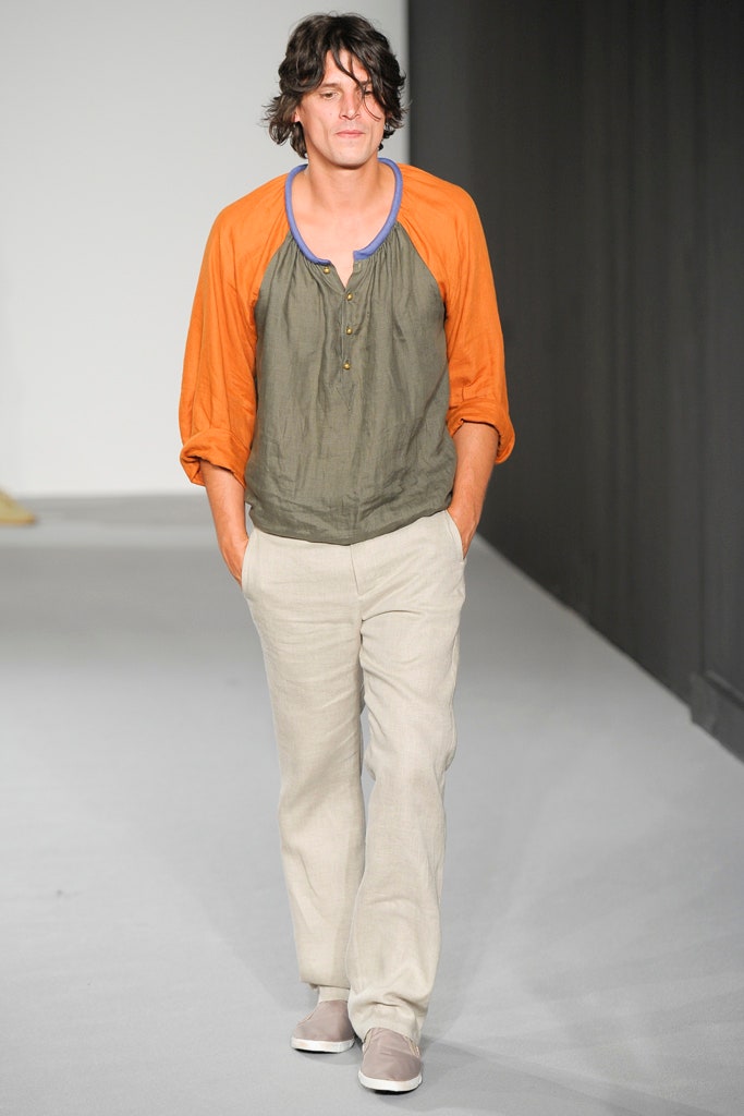 relaxed orange and green shirt with beige pants