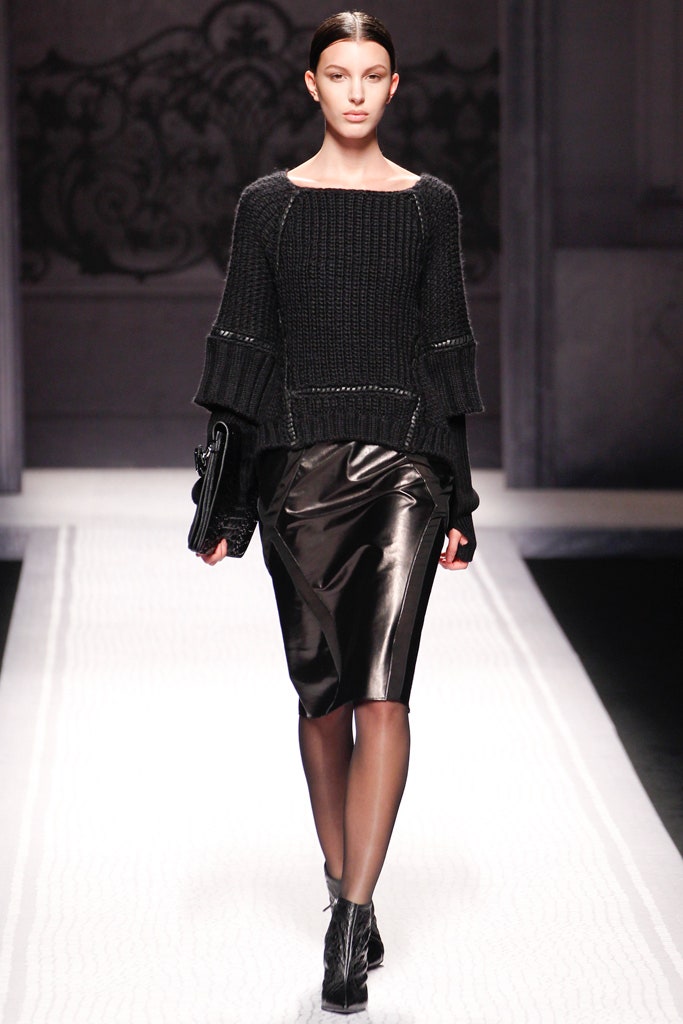 black wool sweater and leather skirt