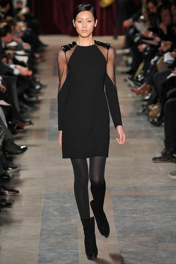fitted black dress with cutouts
