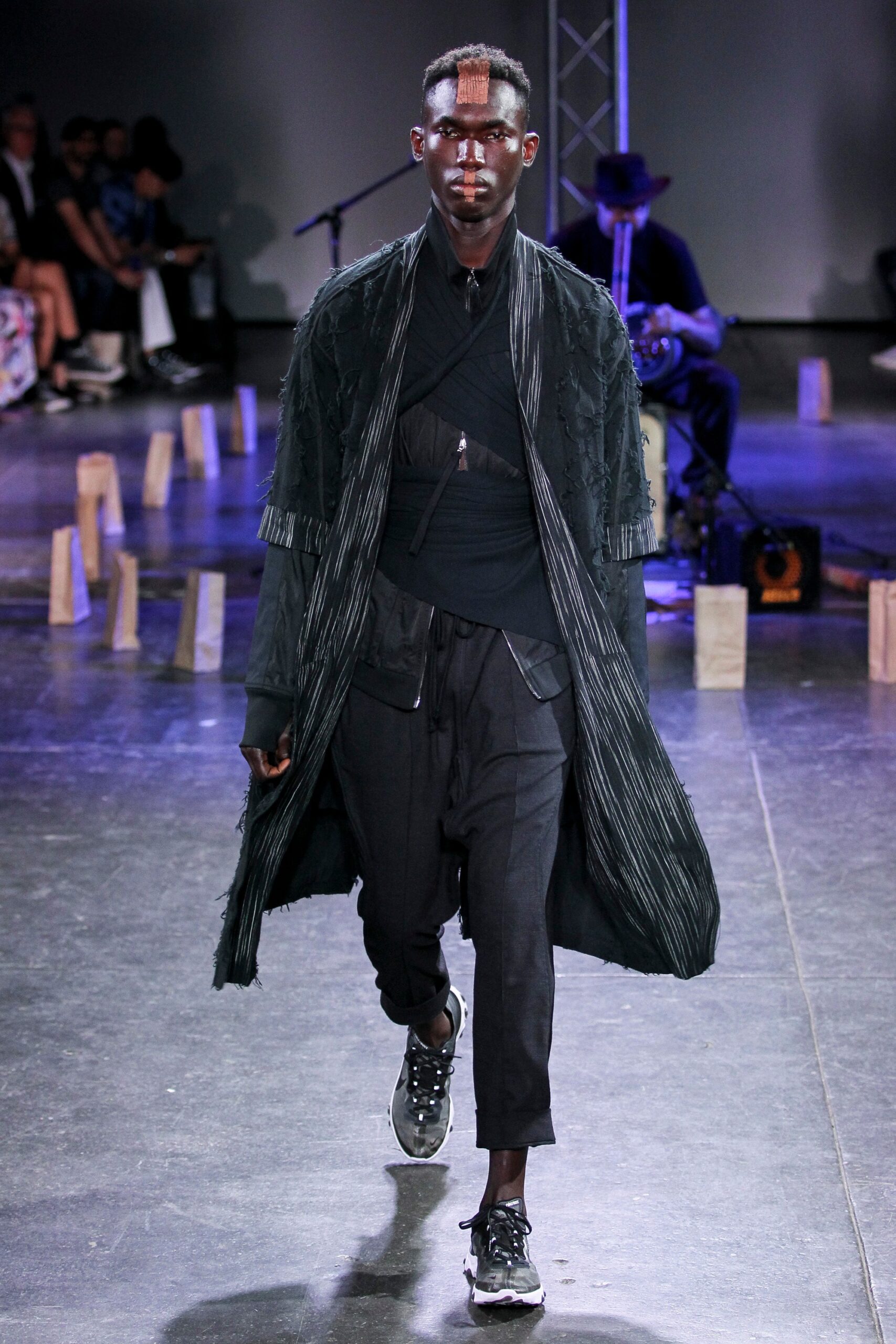 black pleated coat with fitted top