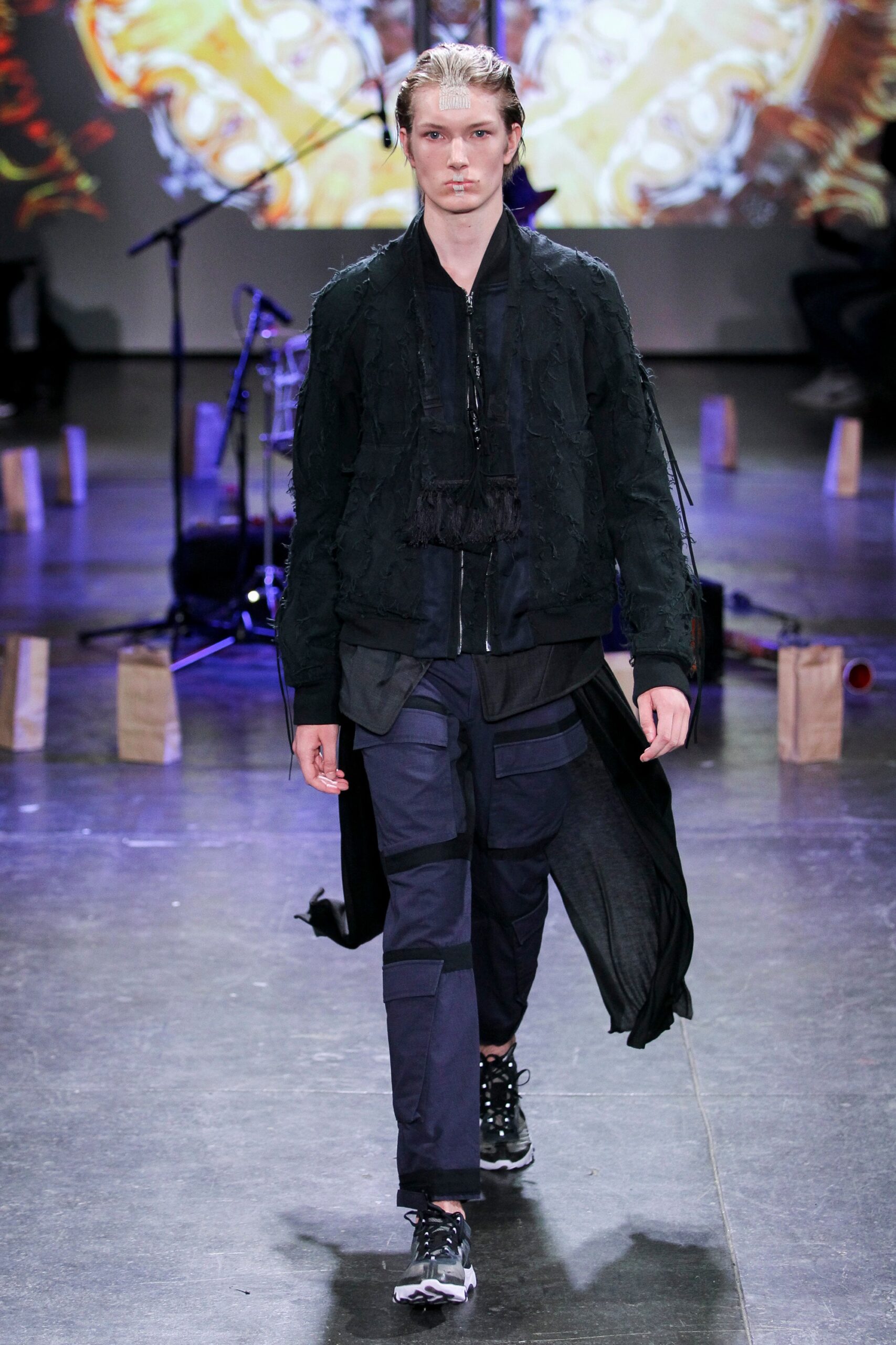 black relaxed coat with cargo pants
