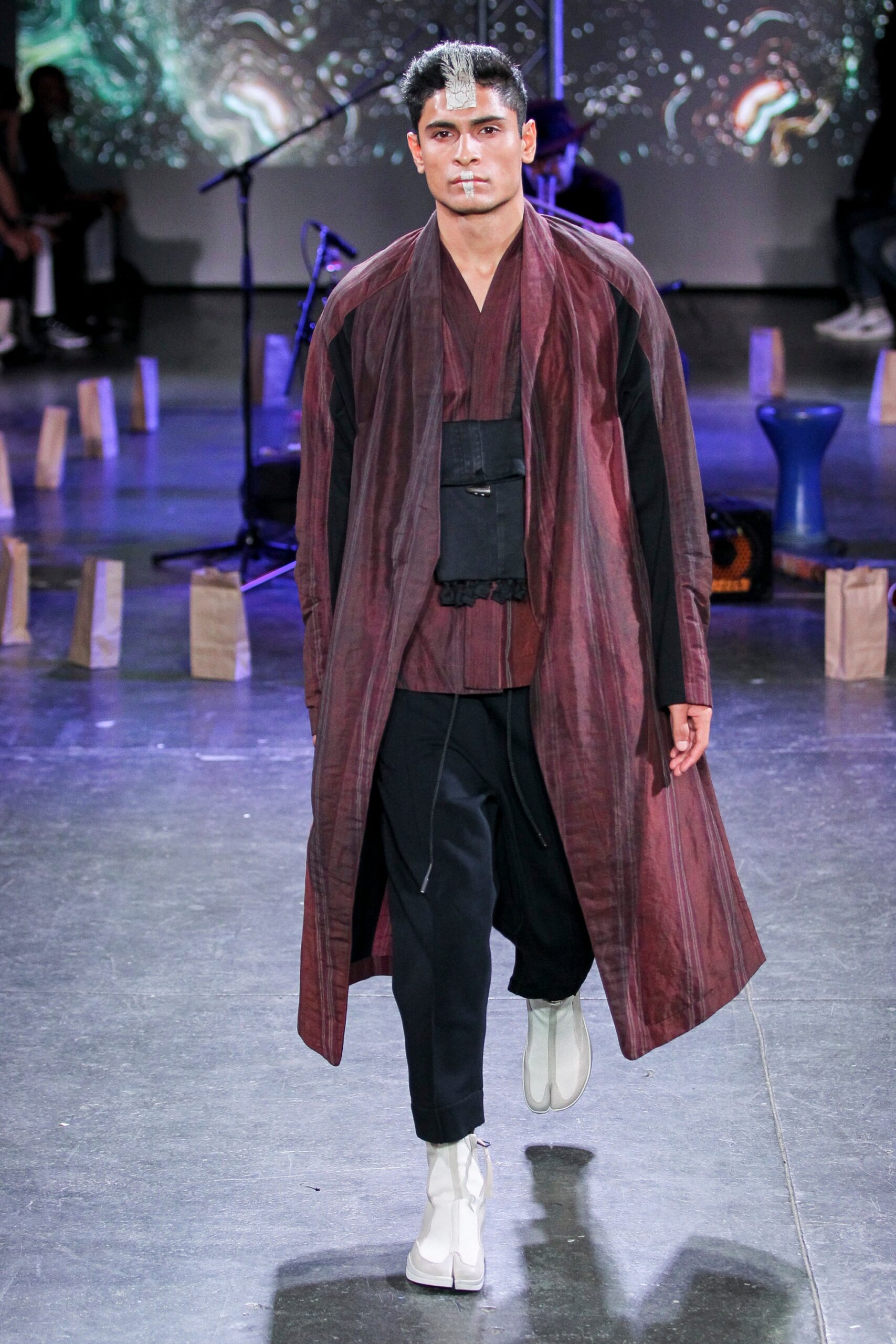 red silk coat with black top