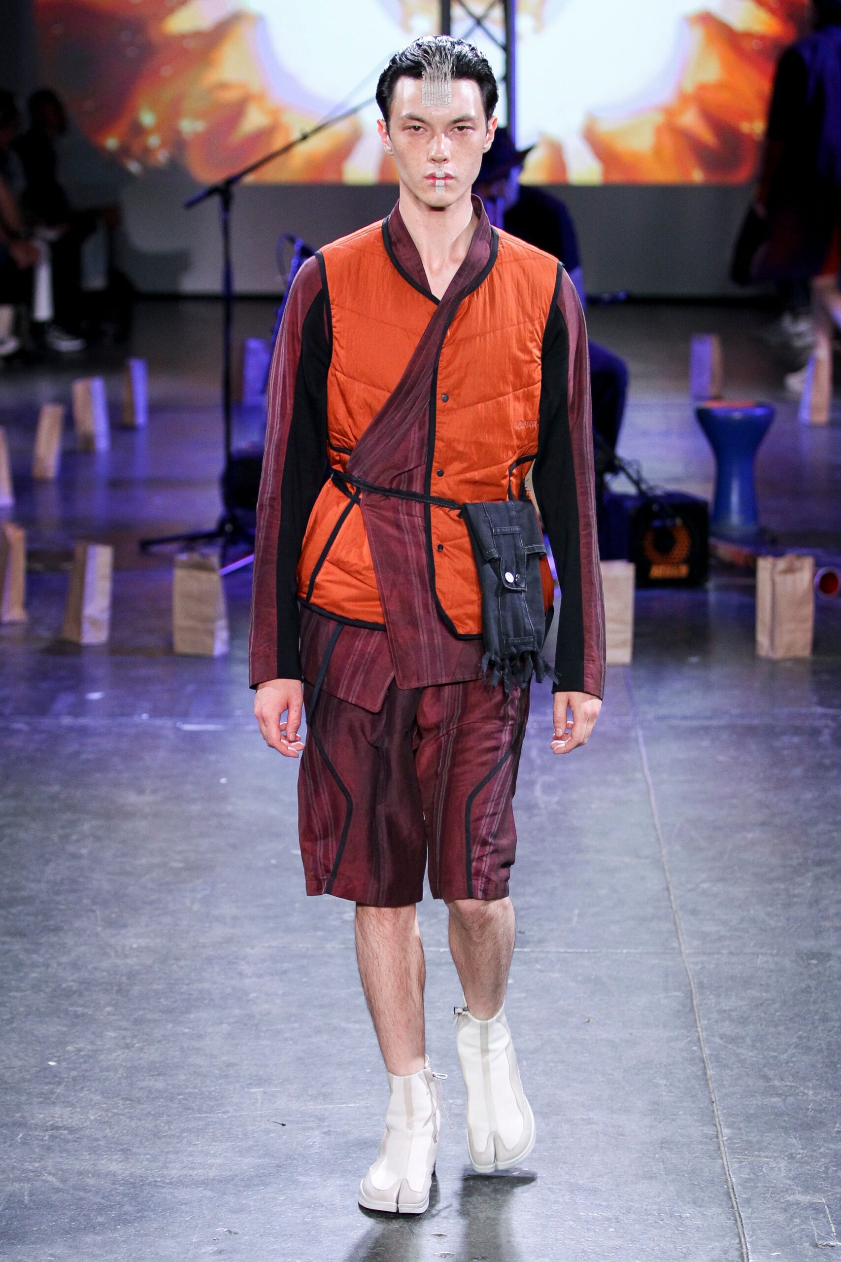 orange jacket with purple shorts