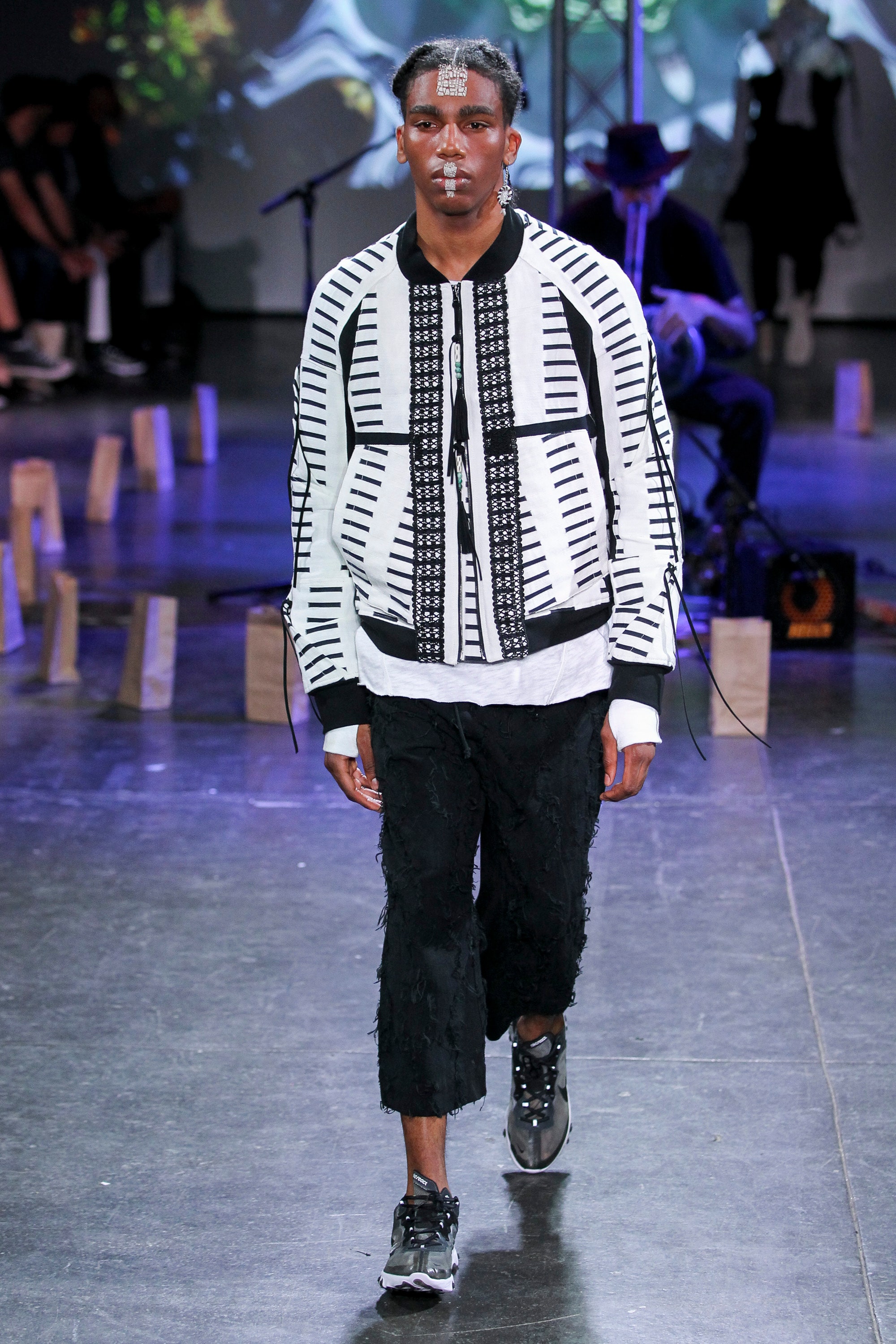 black and white printed jacket with relaxed pants