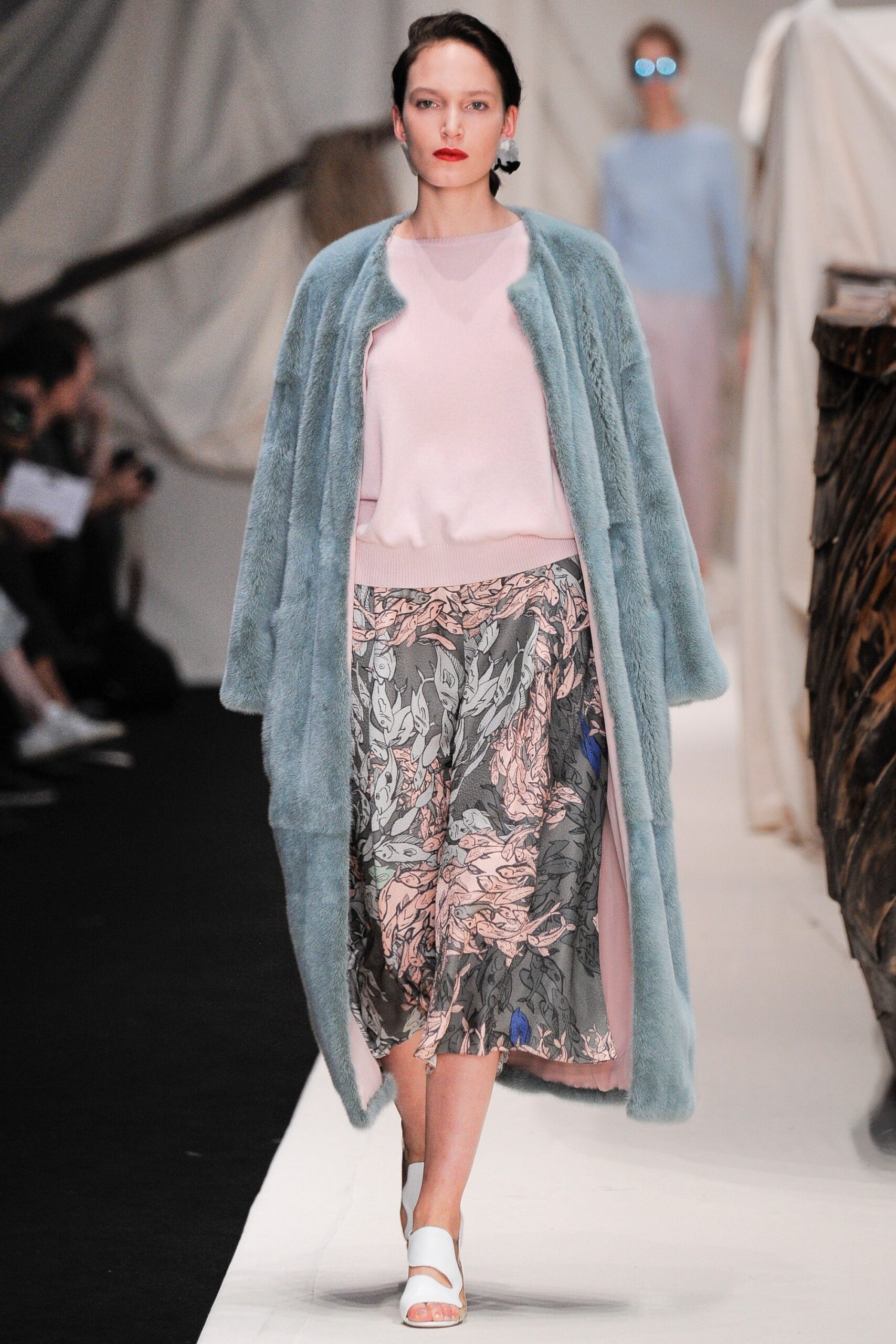 blue faux-fur coat with pink top