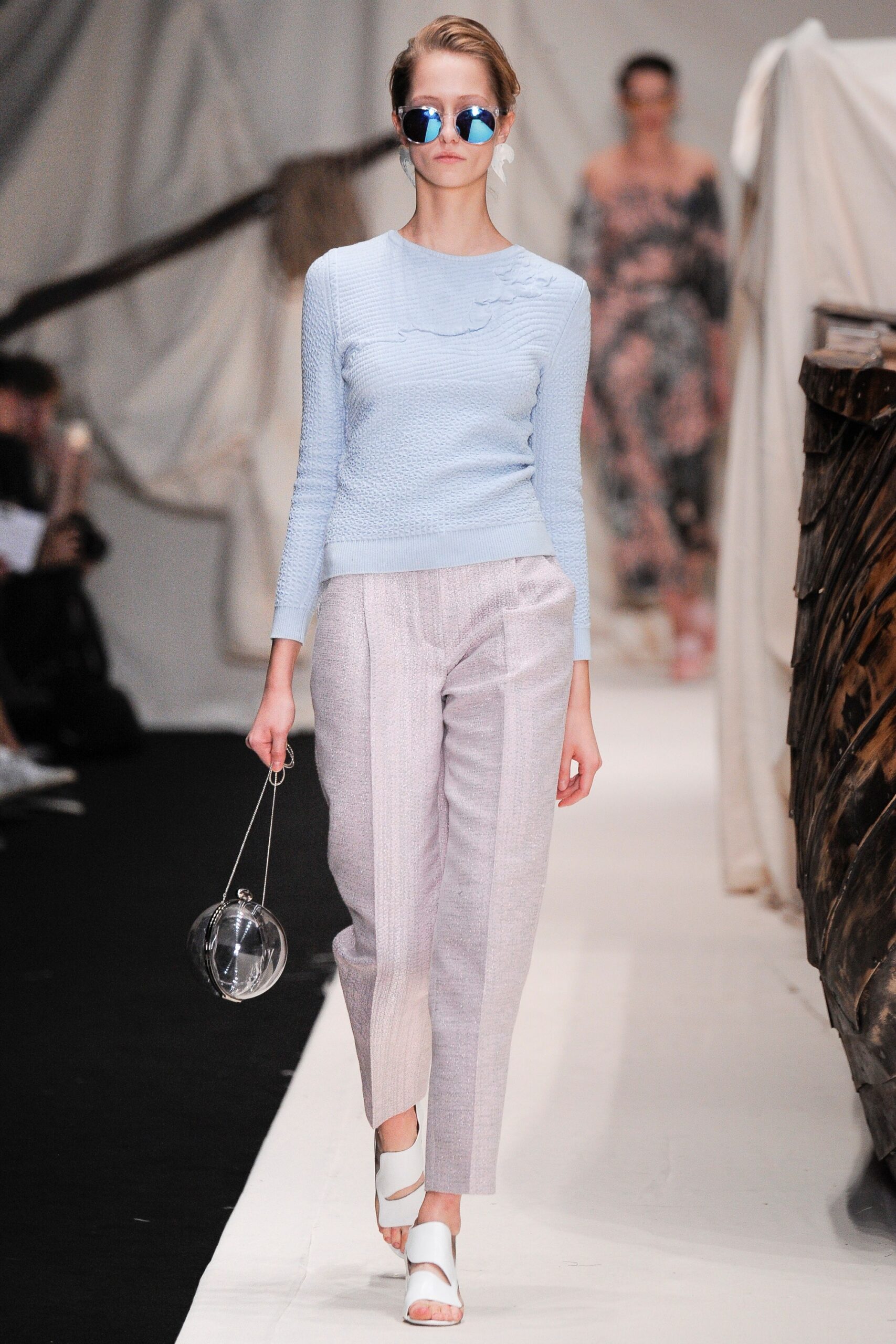 blue fitted top with relaxed pants