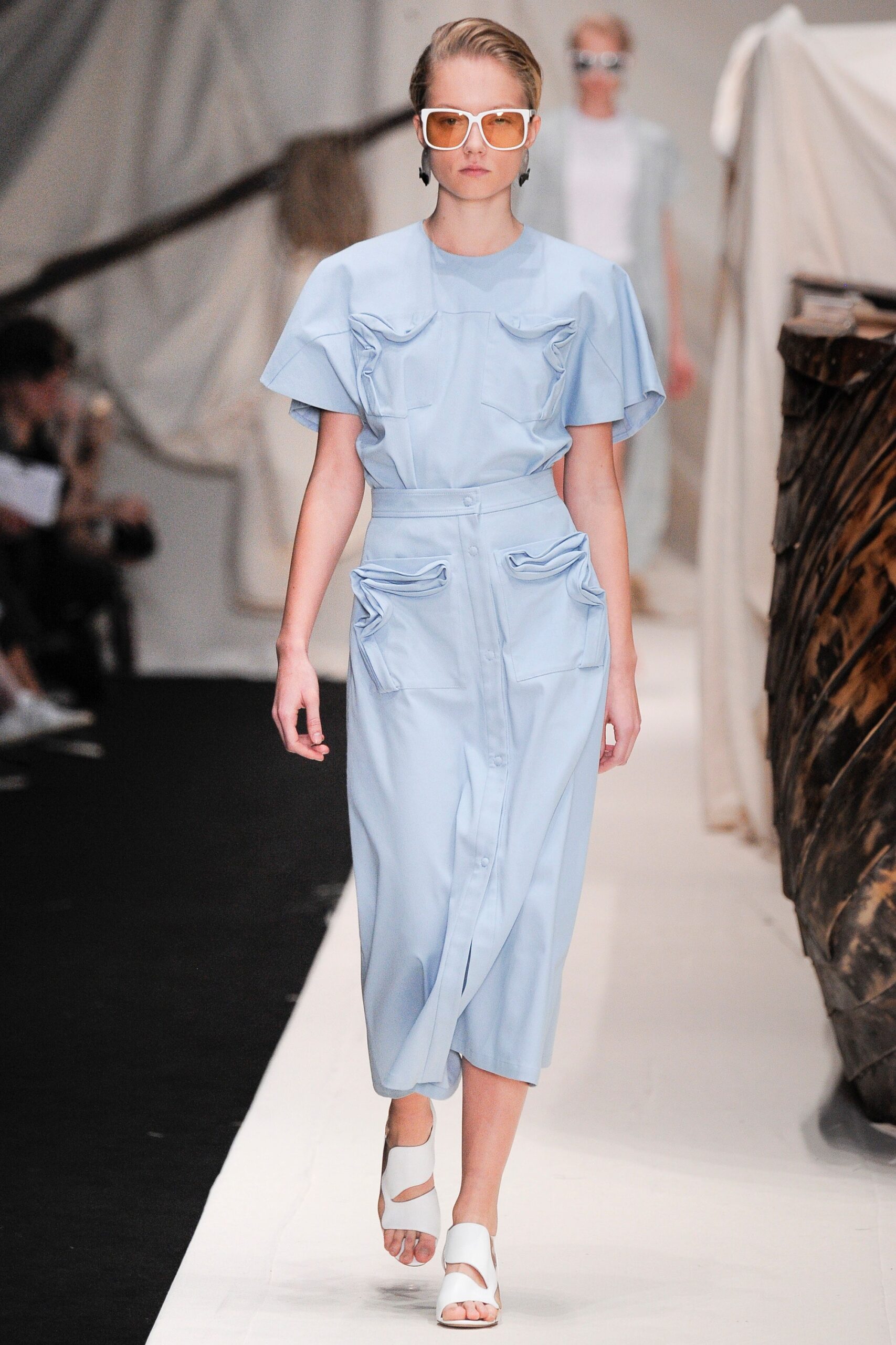 blue fitted midi dress with pockets