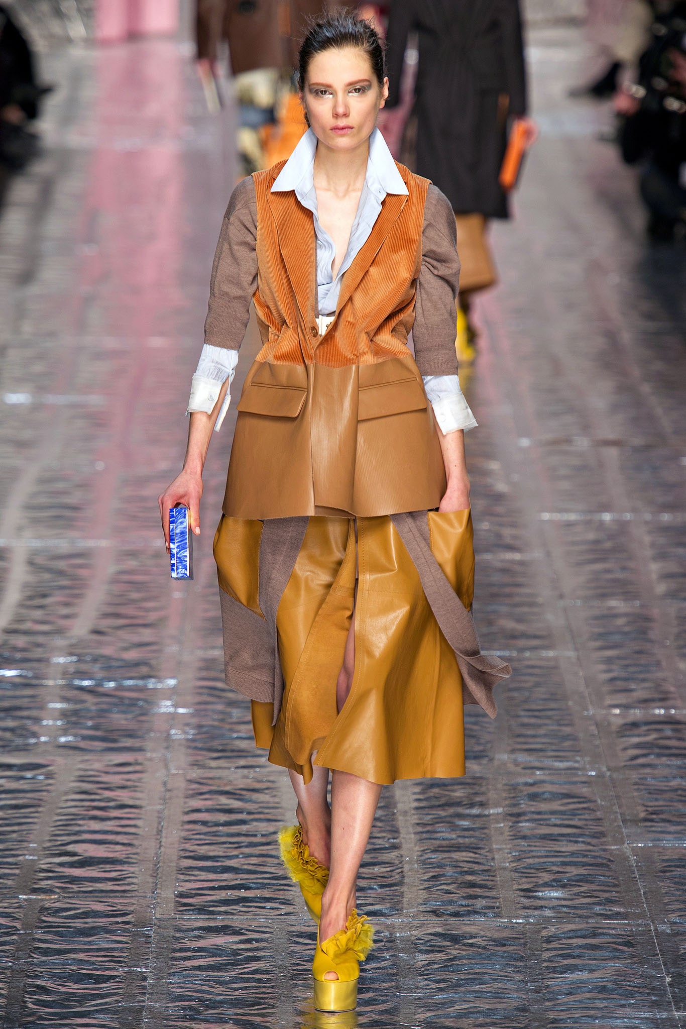 orange leather blazer with blue shirt