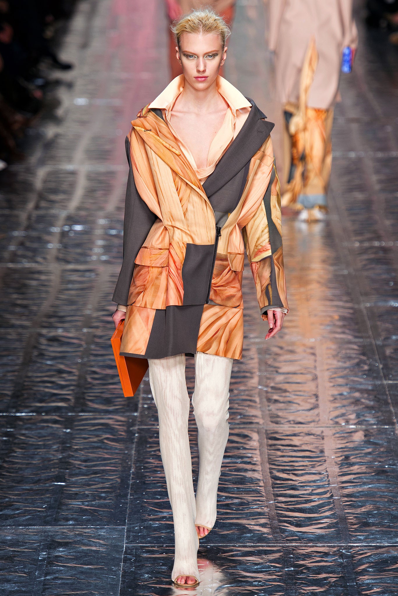 gray and orange layered coat with slim pants