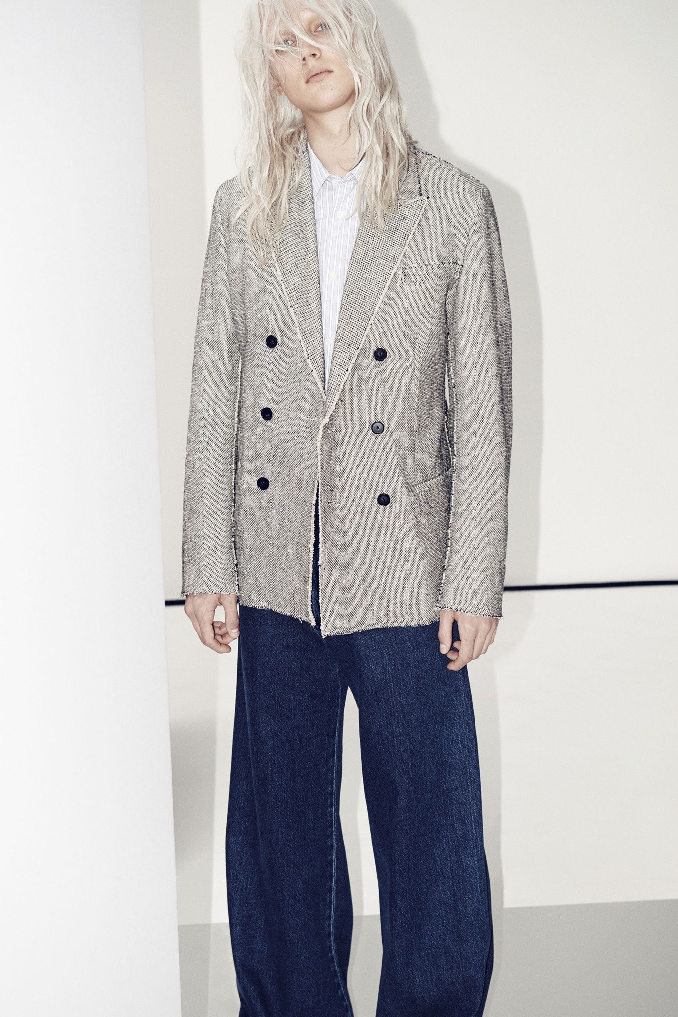 gray tweed blazer with denim pants