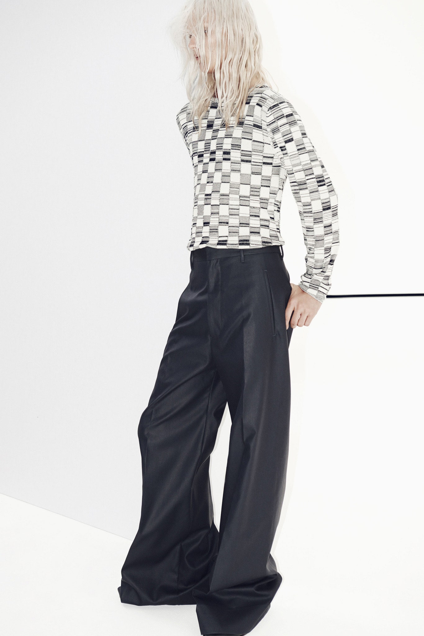 black wide-leg pants and checked top