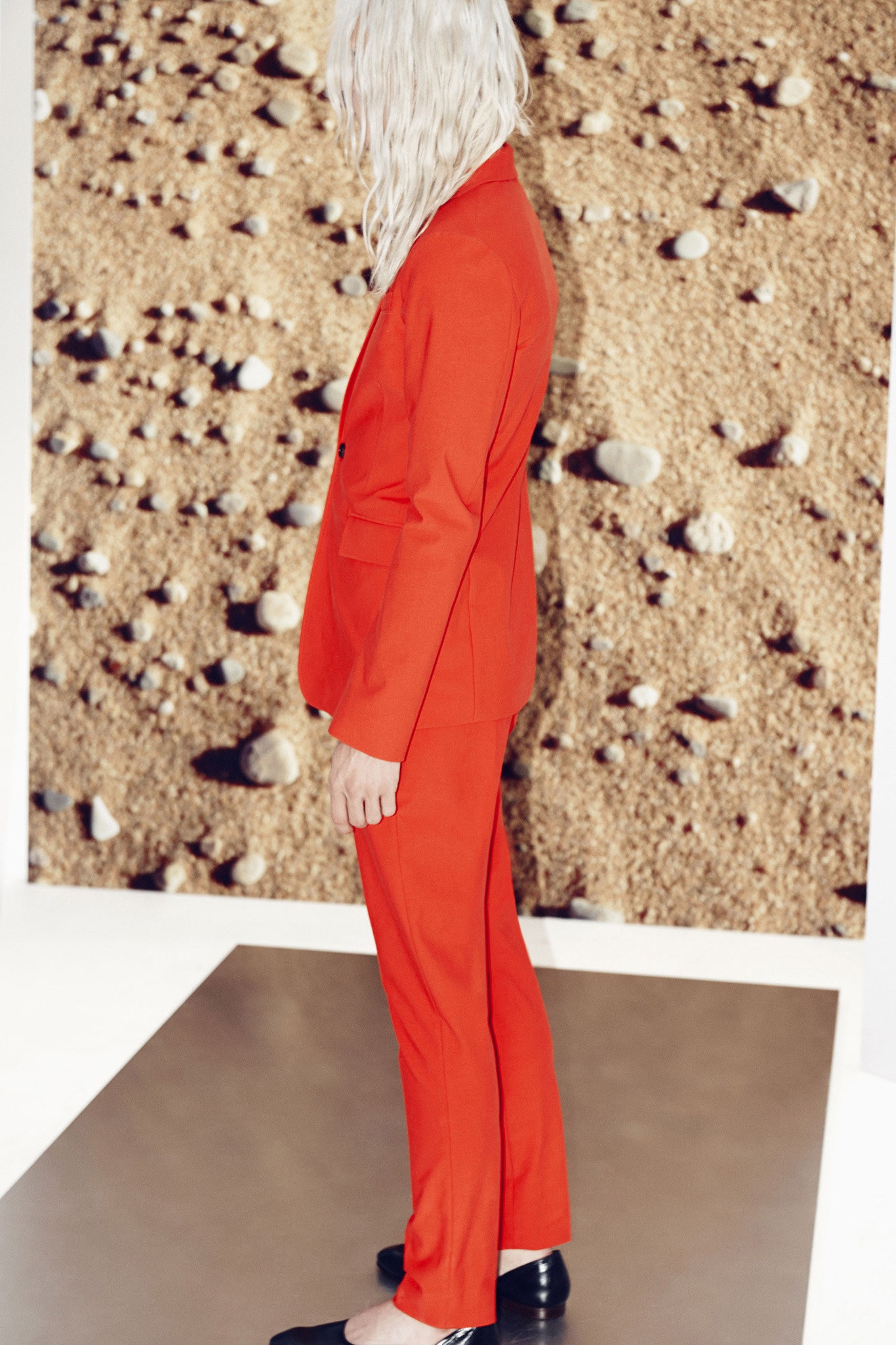 red tailored suit