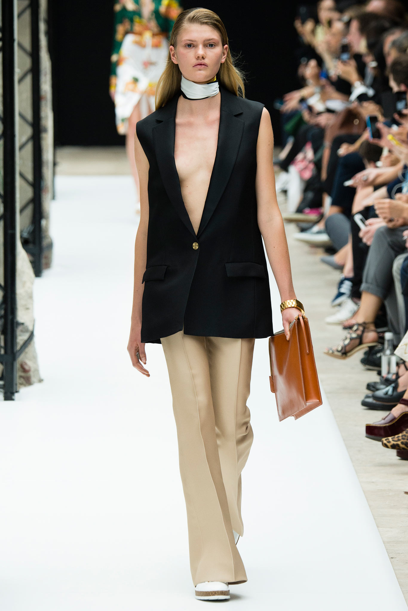 black blazer beige pants