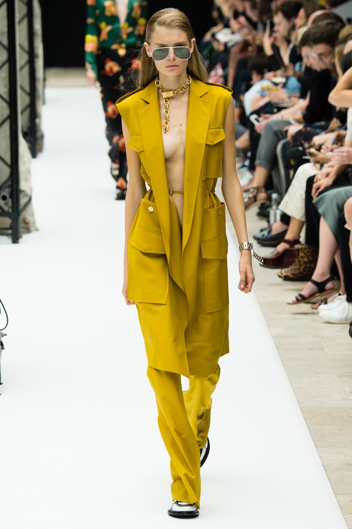 yellow sleeveless jacket and pants