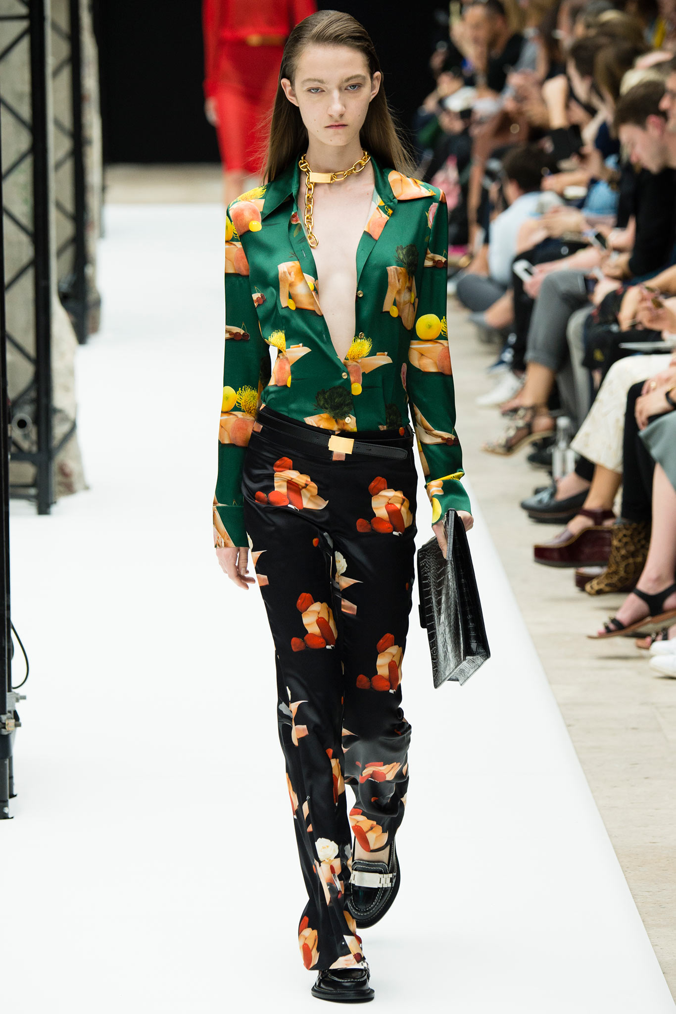 green printed silk shirt with black pants