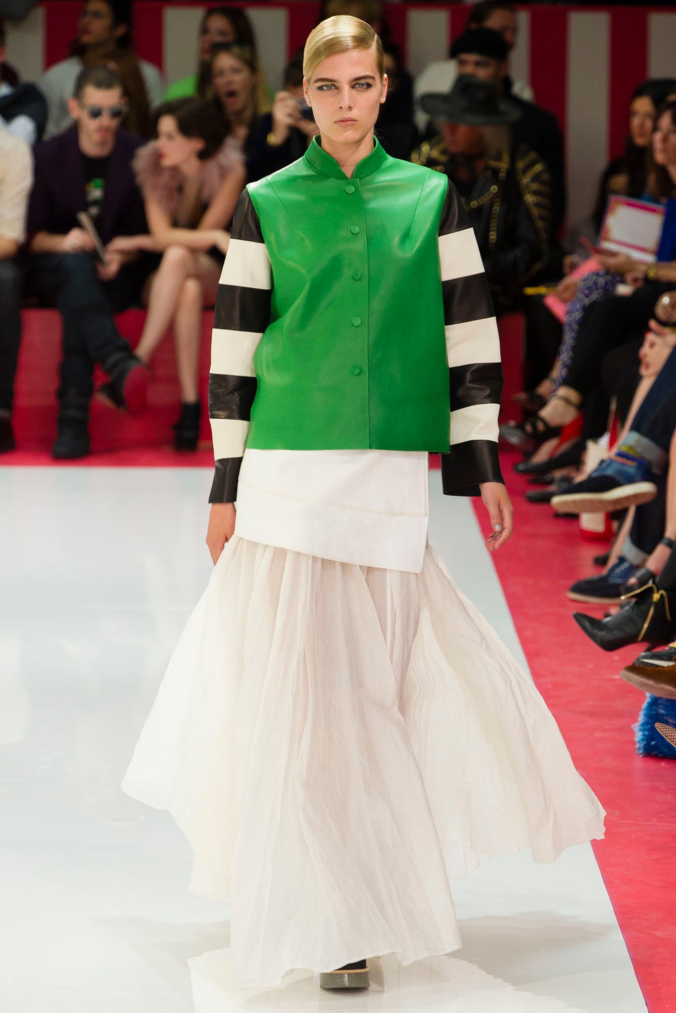 green leather top with white skirt