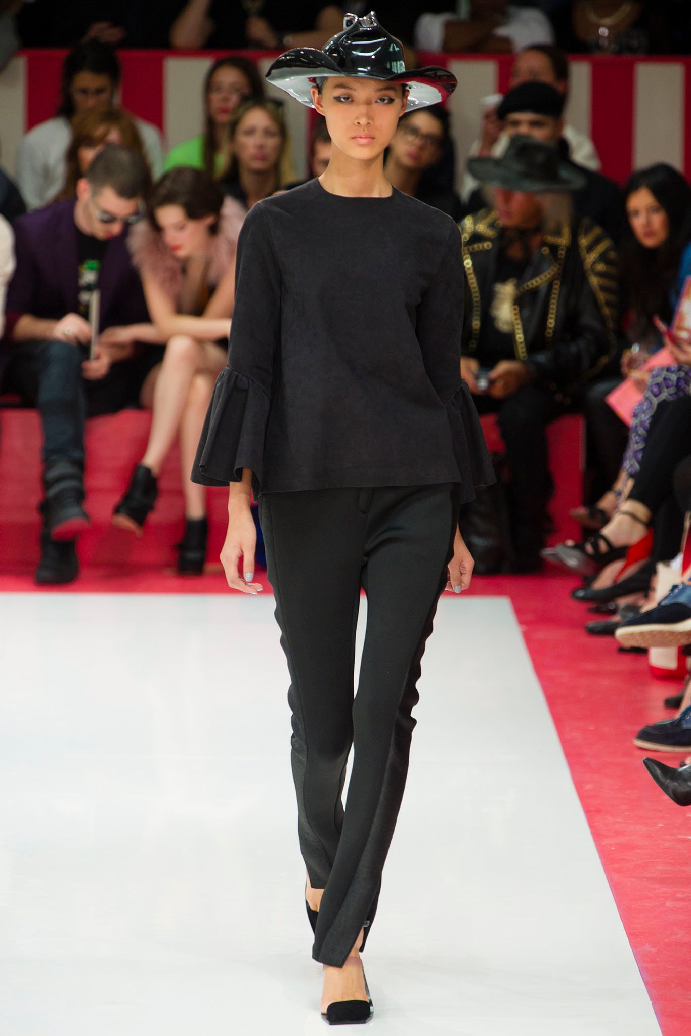 black fitted top and slim pants