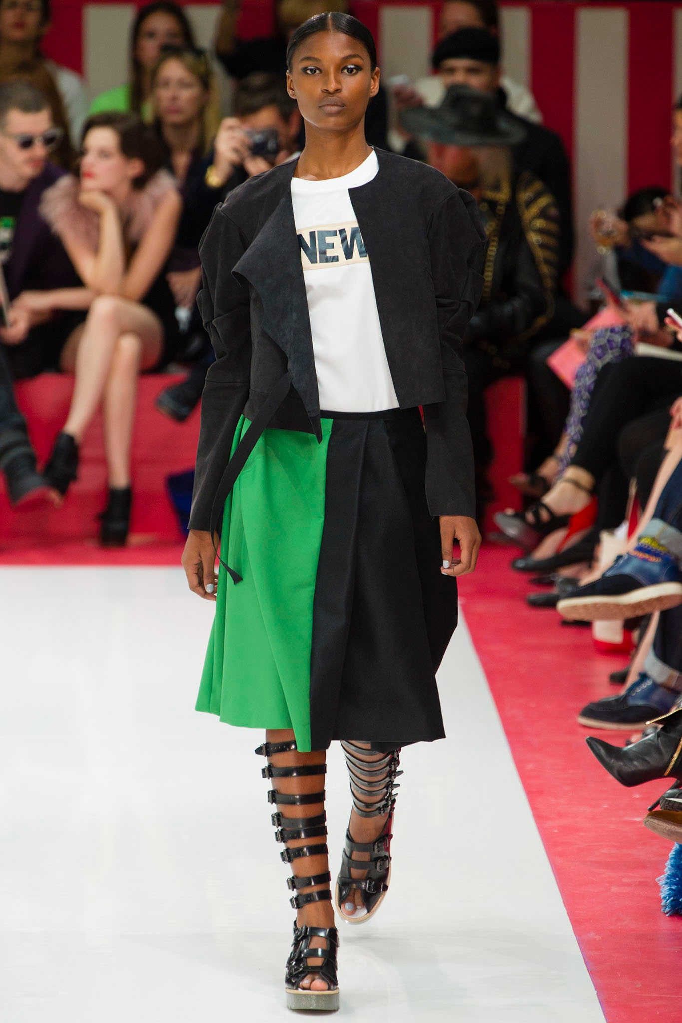 black jacket white top color-blocked skirt