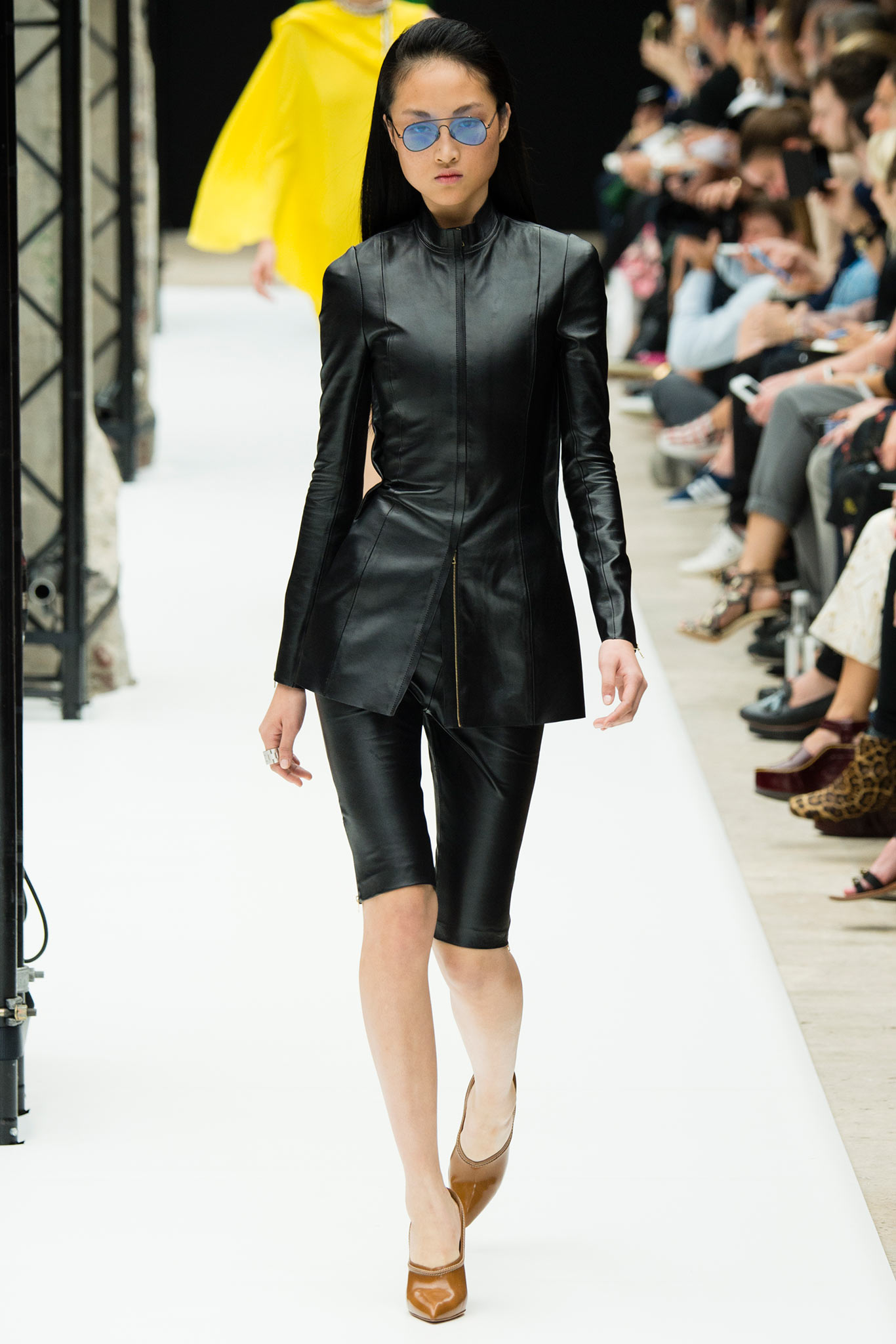black leather fitted jacket and shorts