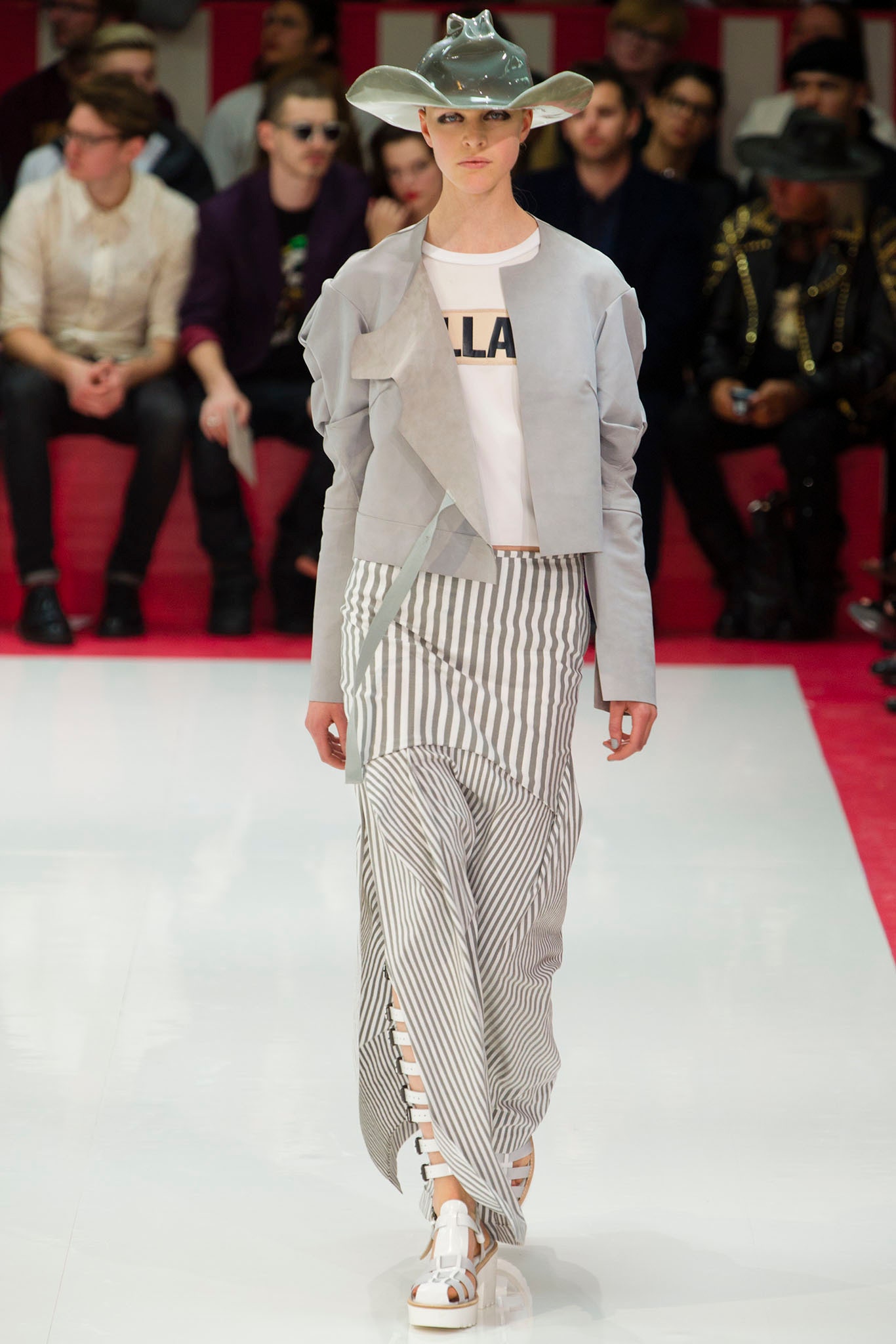 gray jacket white top striped skirt