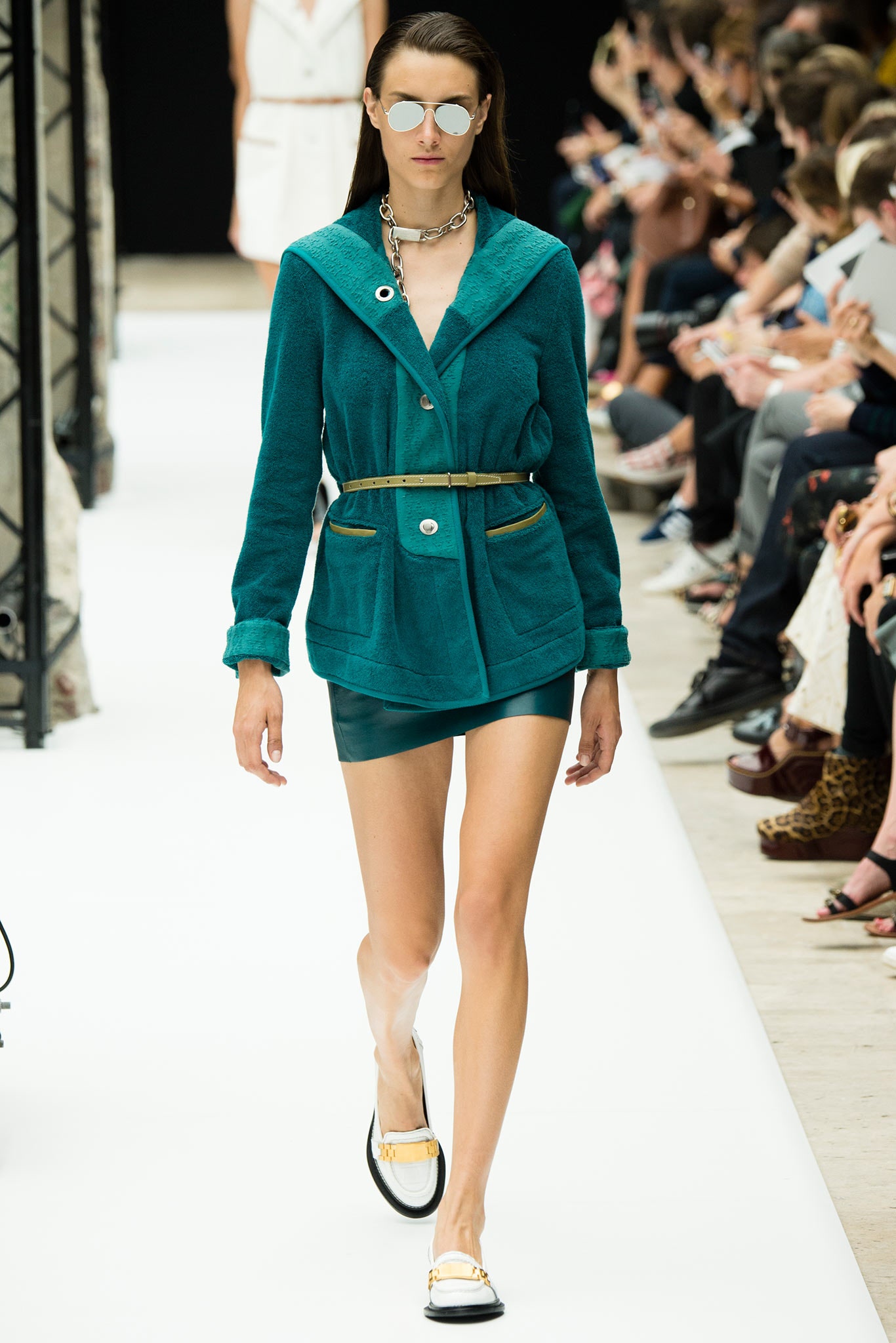 teal fitted jacket with mini skirt