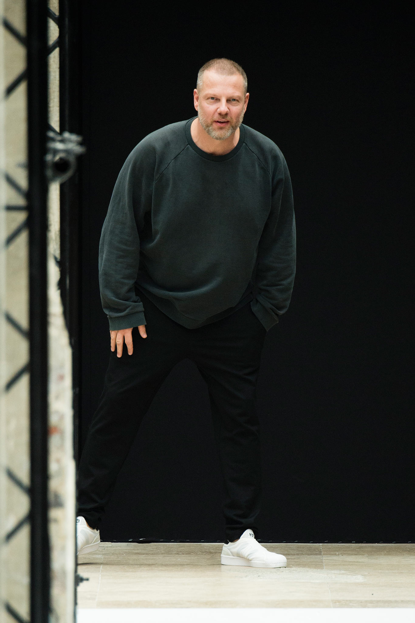 gray relaxed sweater with black pants