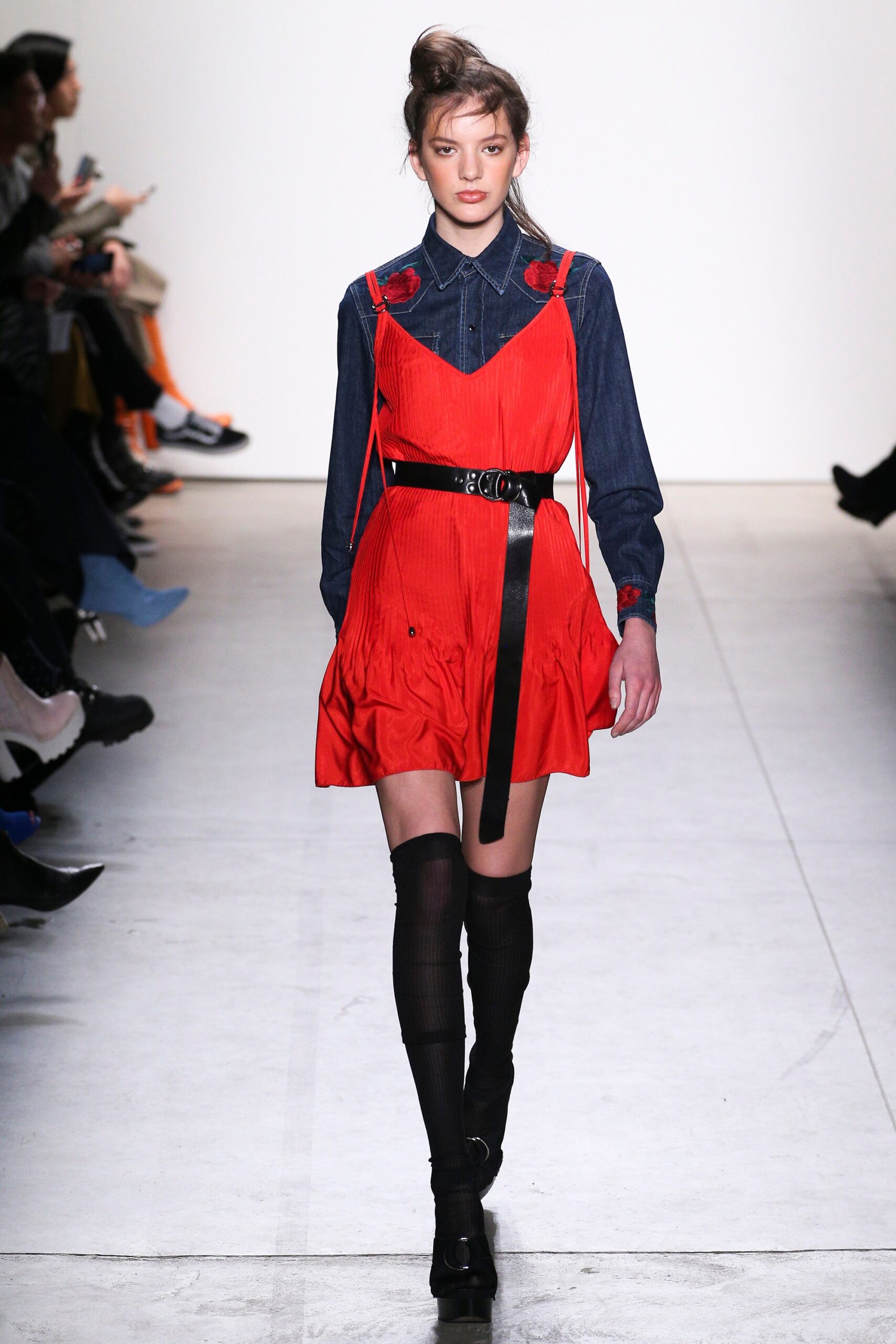 red pleated mini dress with denim shirt