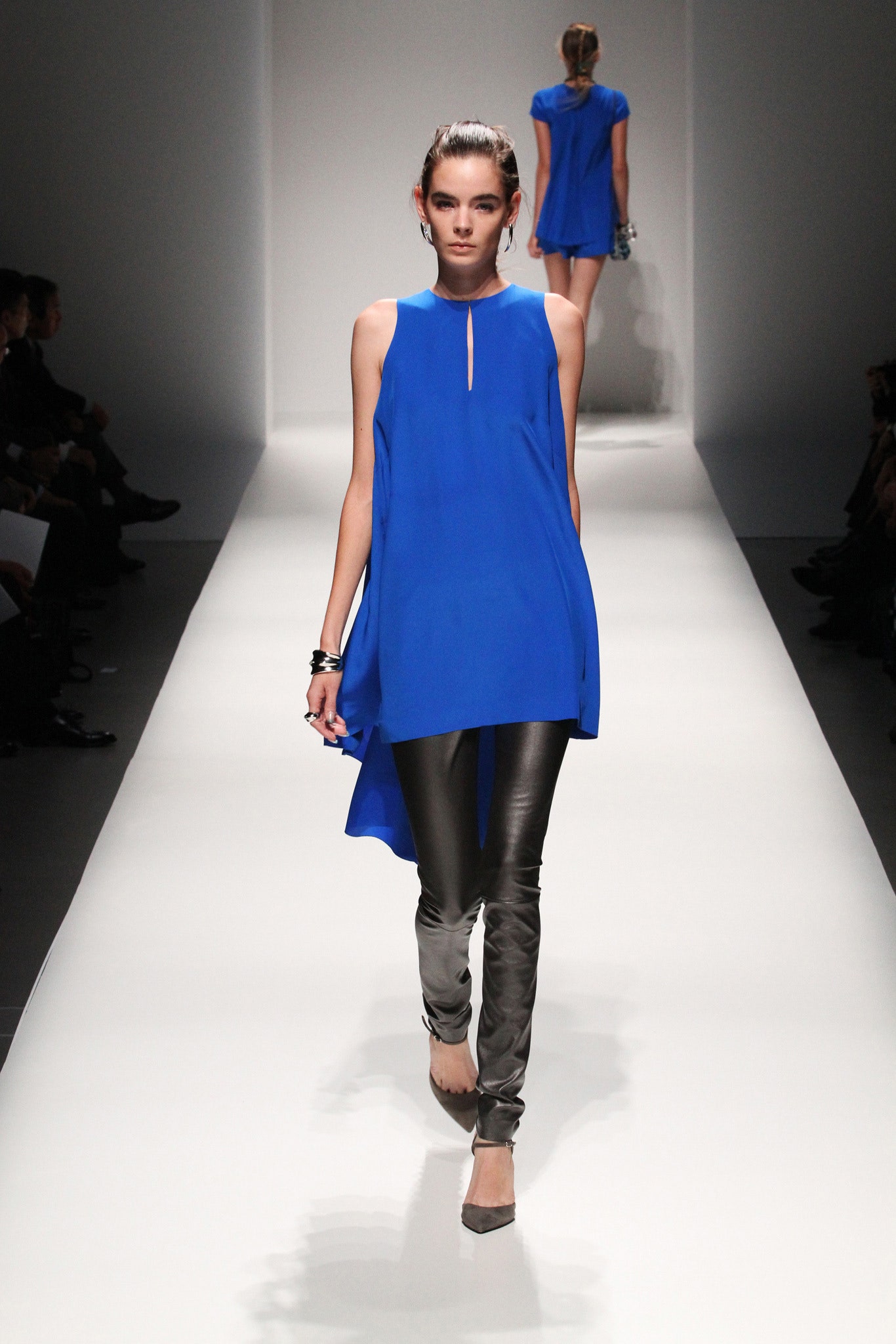blue sleeveless high-neck relaxed top