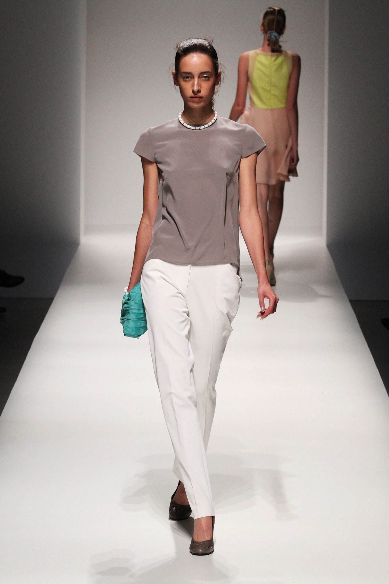 gray silk top with tailored pants