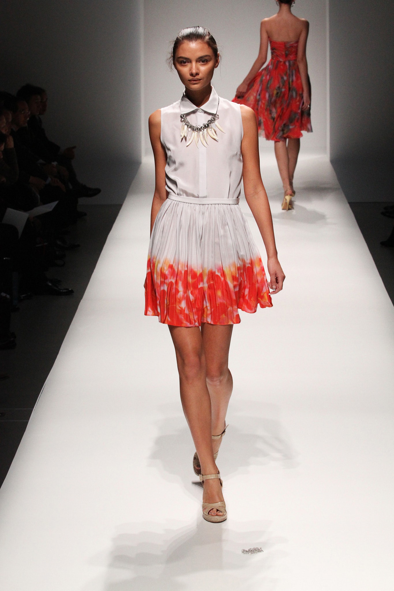 gray and orange pleated dress
