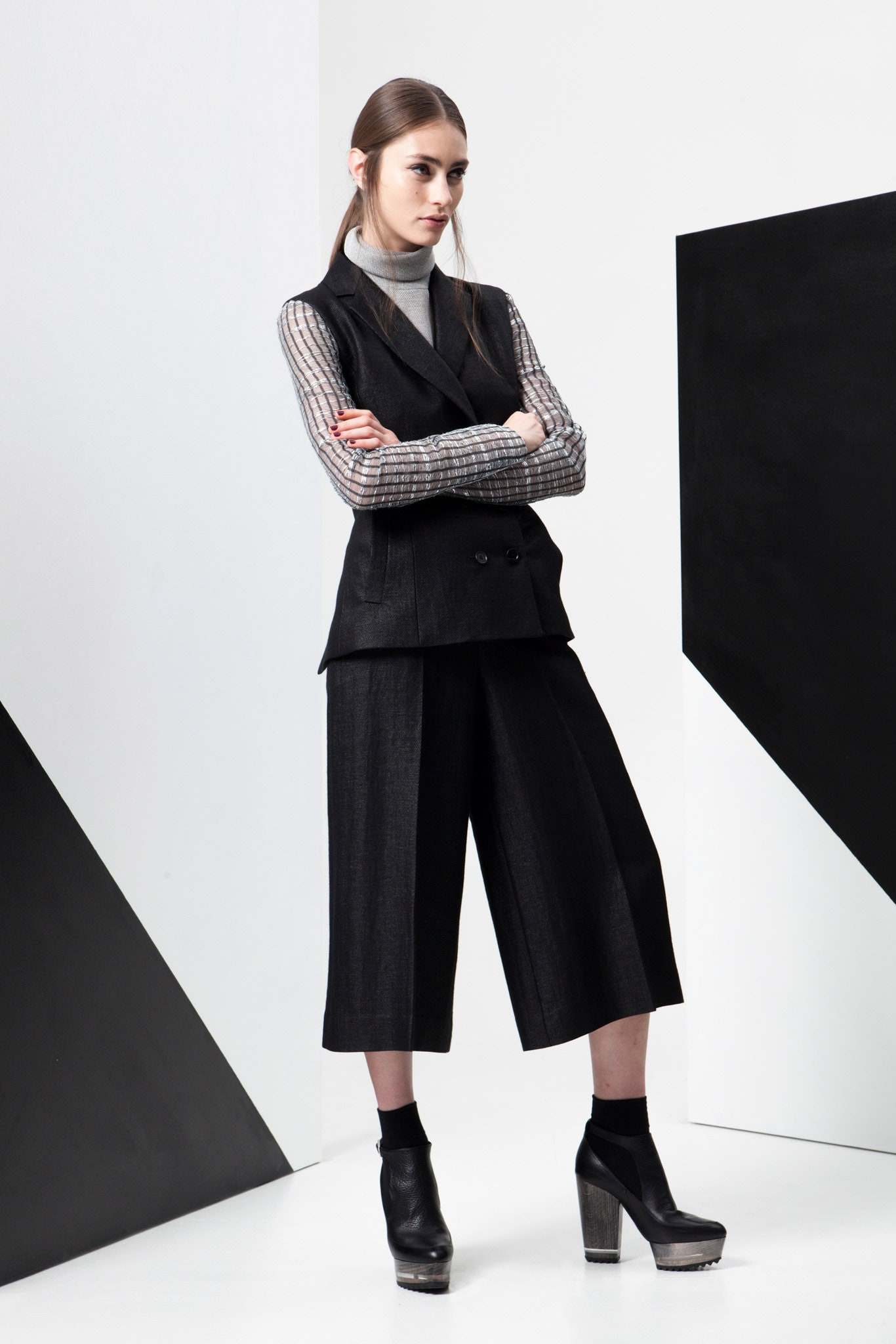 black tailored vest with wide-leg pants