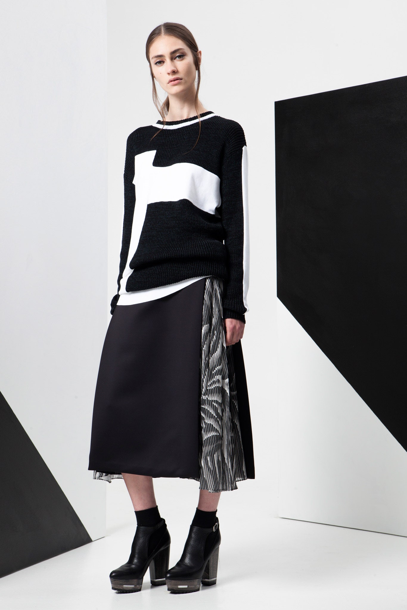 black and white color-blocked sweater with midi skirt