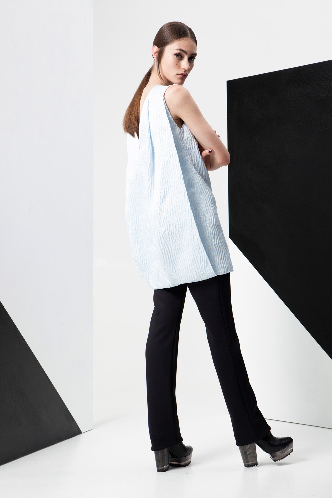 blue relaxed top with black pants