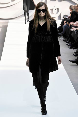 black fur coat and dress