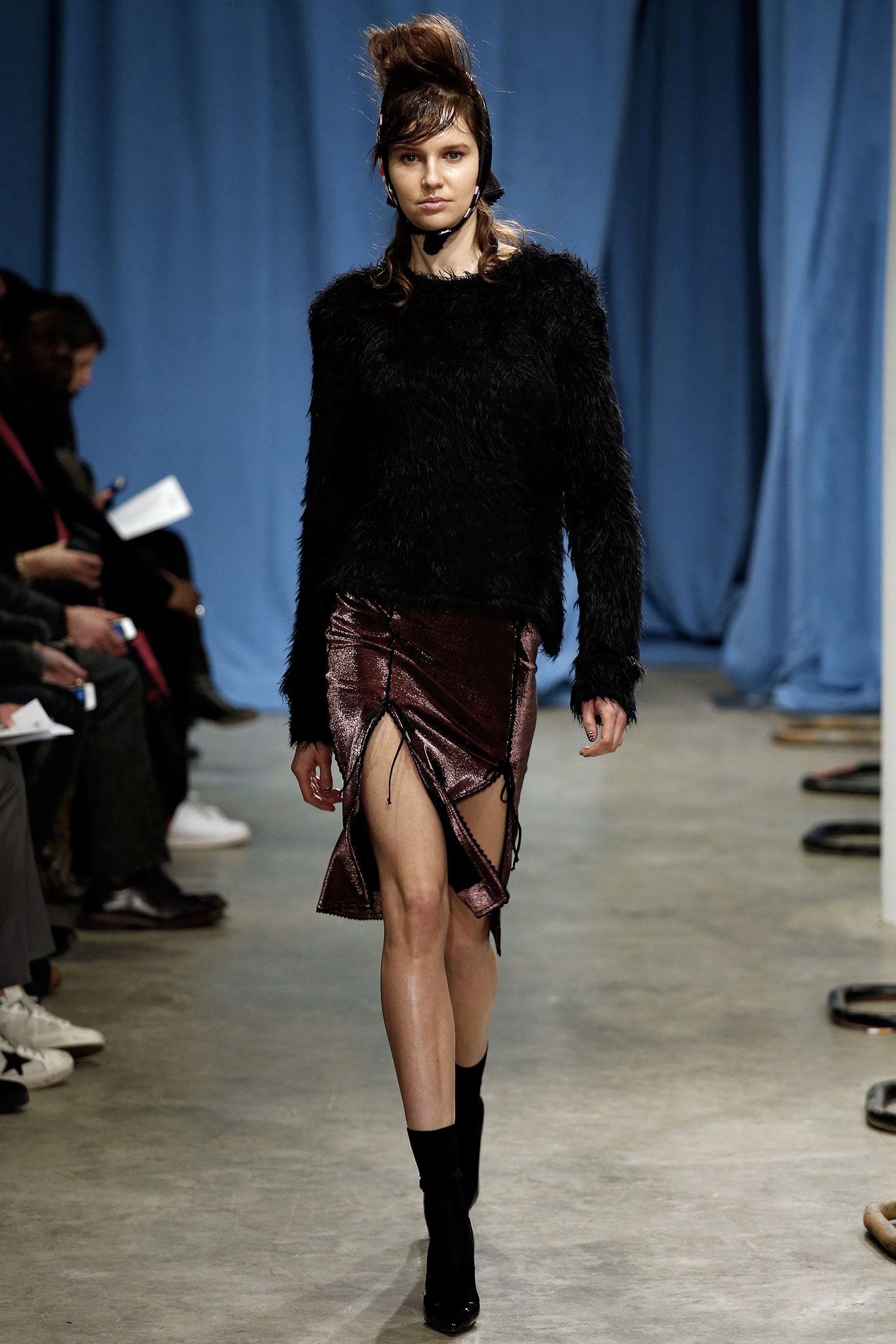 black fur top with purple skirt