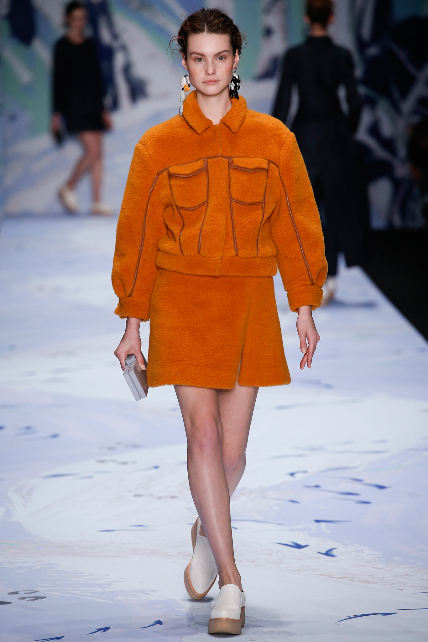 orange faux-fur jacket and skirt