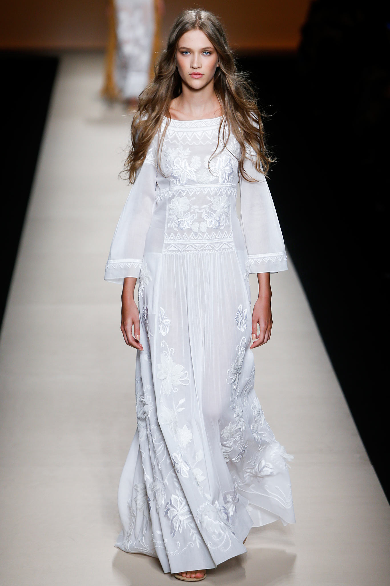 white silk embroidered gown