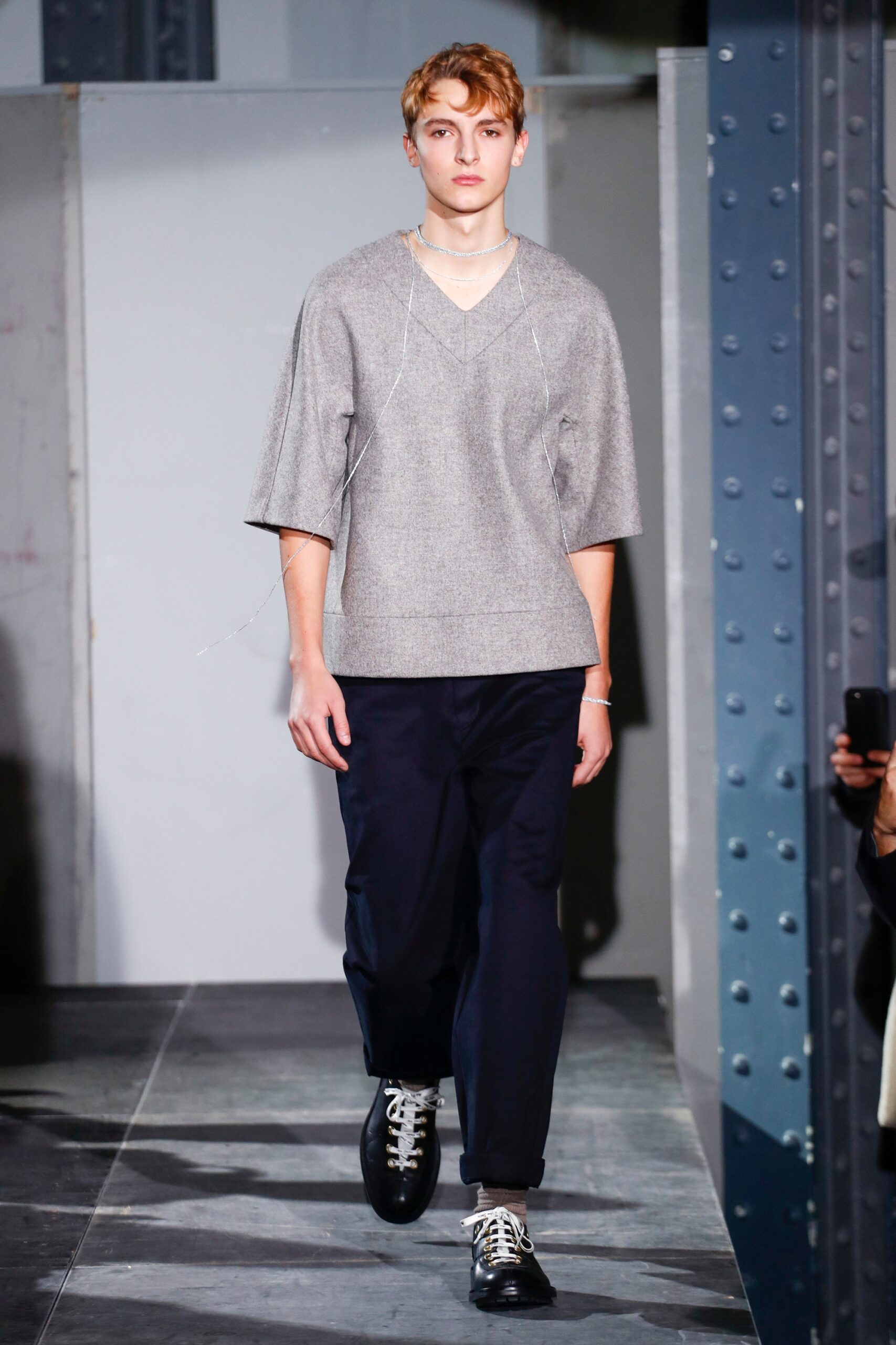 gray relaxed top with navy pants