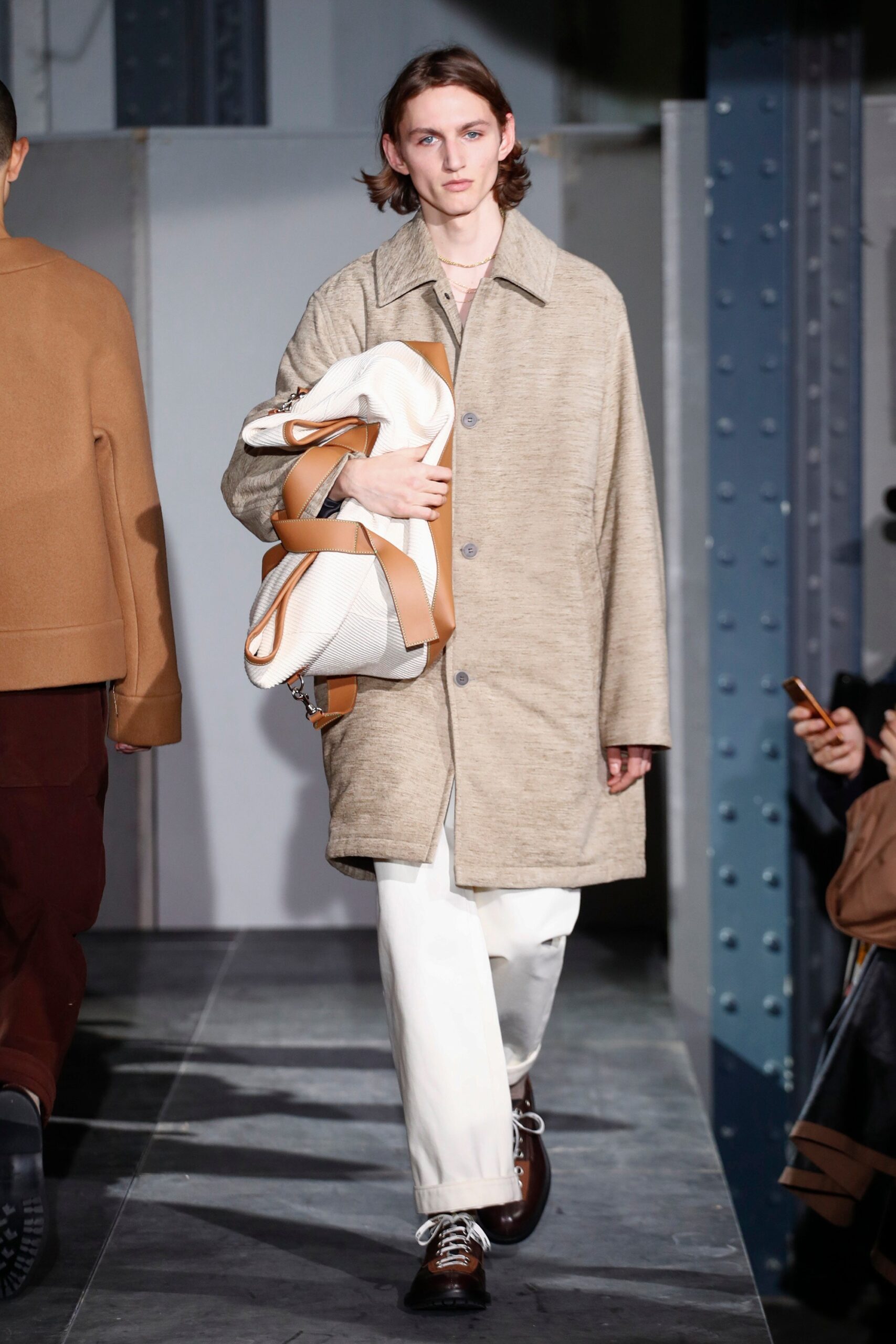 beige relaxed coat with white pants