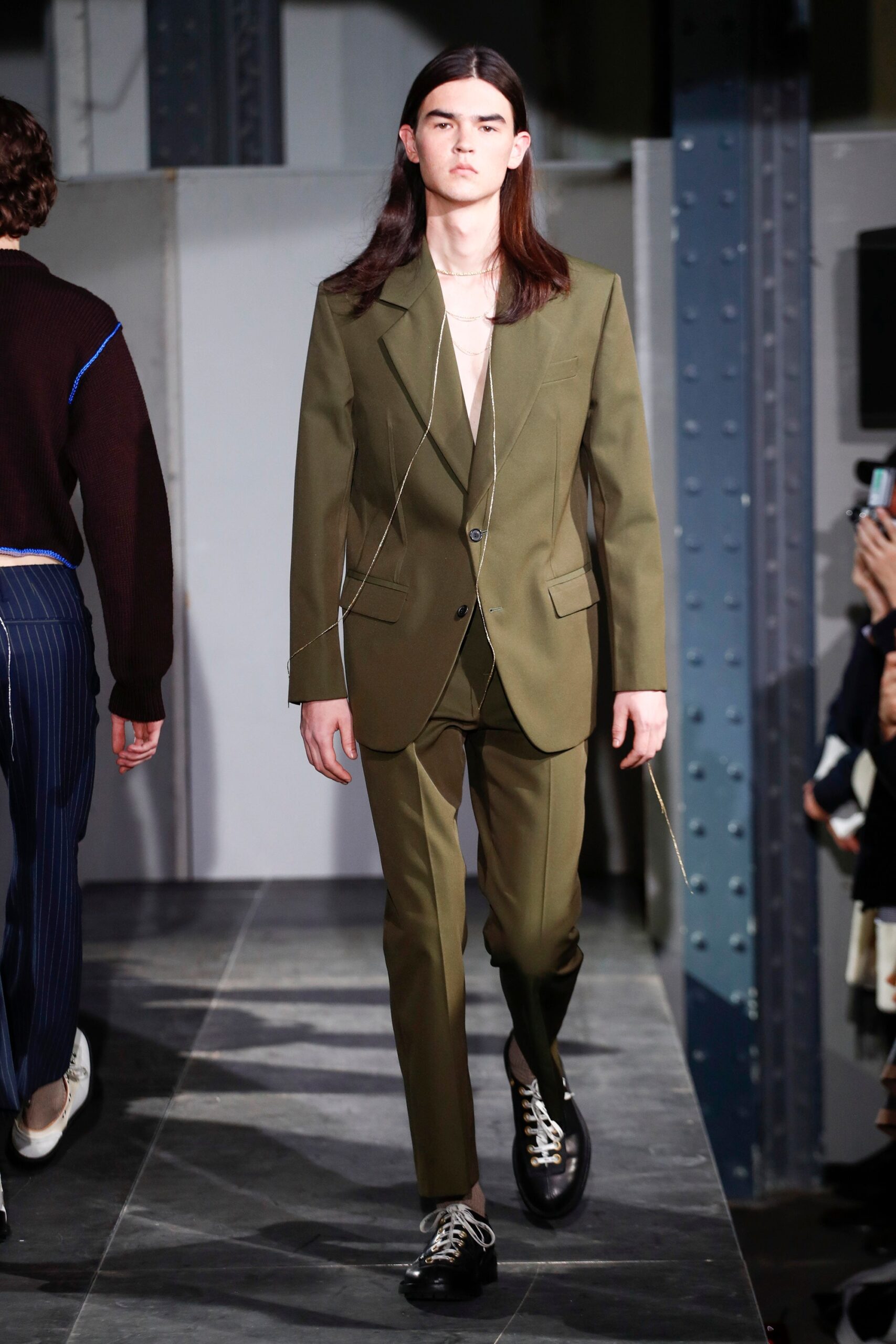 green tailored suit